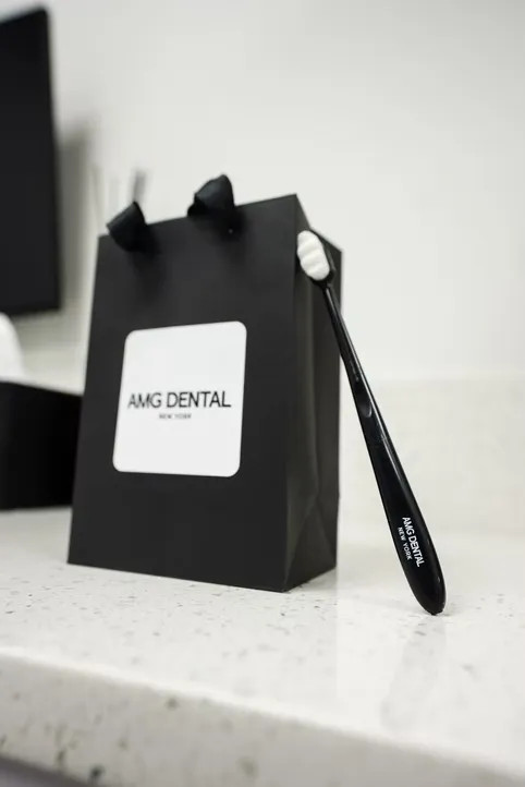 AMG Dental gift bag and toothbrush